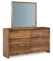 Ashley Furniture Dressonni bedroom set featuring a coordinated bedroom package with a stylish bed, nightstands, and matching decor.