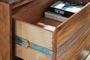 Ashley Furniture Dressonni nightstand with wood finish, drawer handle details, and a sleek modern design.