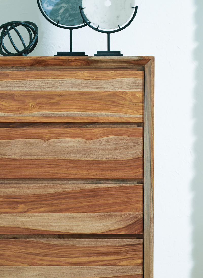 Ashley Furniture Dressonni Chest of Drawers with sleek wood finish and multiple drawers, detailed close-up image showcasing craftsmanship.