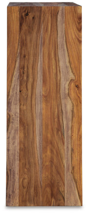 Ashley Furniture Dressonni chest of drawers with sleek wood finish and modern design, shown from a side view.