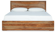 Ashley Furniture Dressonni bedroom set with a stylish bed, nightstands, and dresser shown from a head-on angle.