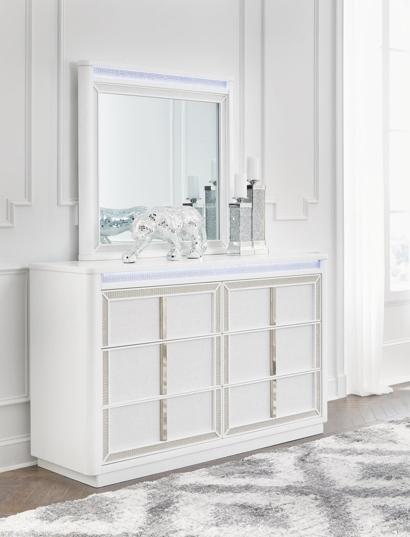 Ashley Furniture Chalanna Bedroom Set with LED lighting, featuring a modern bed frame and matching nightstands, in a stylish bedroom scene.