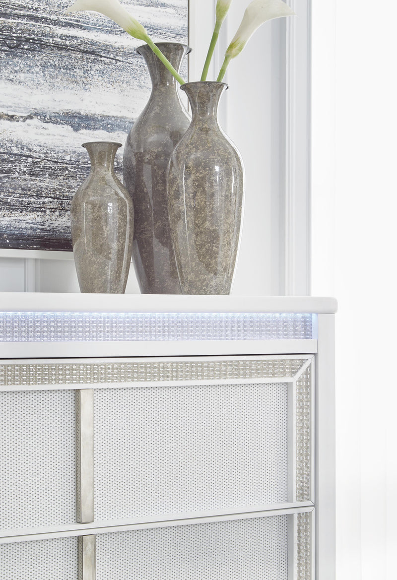 Ashley Furniture Chalanna chest of drawers with sleek wood finish and modern design, featuring multiple spacious drawers.