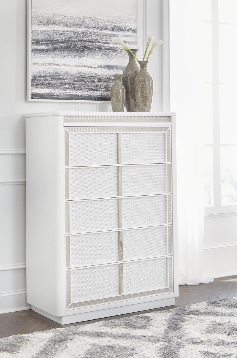 Ashley Furniture Chalanna chest of drawers featuring a sleek wooden design and multiple storage drawers.