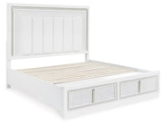 Ashley Furniture Chalanna bedroom set with a bed, dresser, and nightstands, shown from a side angle in a modern bedroom setting.
