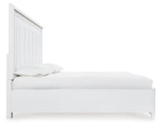 Ashley Furniture Chalanna bedroom set with a queen-sized bed, matching nightstands, and modern bedroom decor in a stylish room.