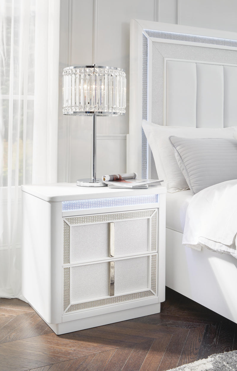 Ashley Furniture Chalanna bedroom set with LED lighting, featuring a modern bed frame and matching nightstands in a stylish bedroom scene.