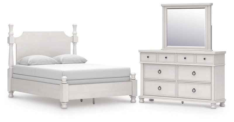 Ashley Furniture Rowlenstown bedroom set featuring a bed frame, matching nightstands, and dresser in a stylish bedroom arrangement.