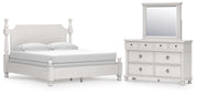 Ashley Furniture Rowlenstown bedroom set featuring a coordinated bed frame, nightstands, and dresser in a modern design.