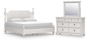 Ashley Furniture Rowlenstown bedroom set with a modern bed frame, matching nightstands, and bedroom decor in a stylish bedroom scene.
