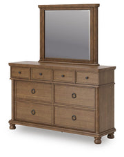 Ashley Furniture Rowlenstown bedroom set with a bed, dresser, and nightstands arranged in a modern bedroom scene.