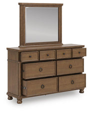 Ashley Furniture Rowlenstown bedroom set with a bed, nightstands, and dresser in a modern bedroom display.