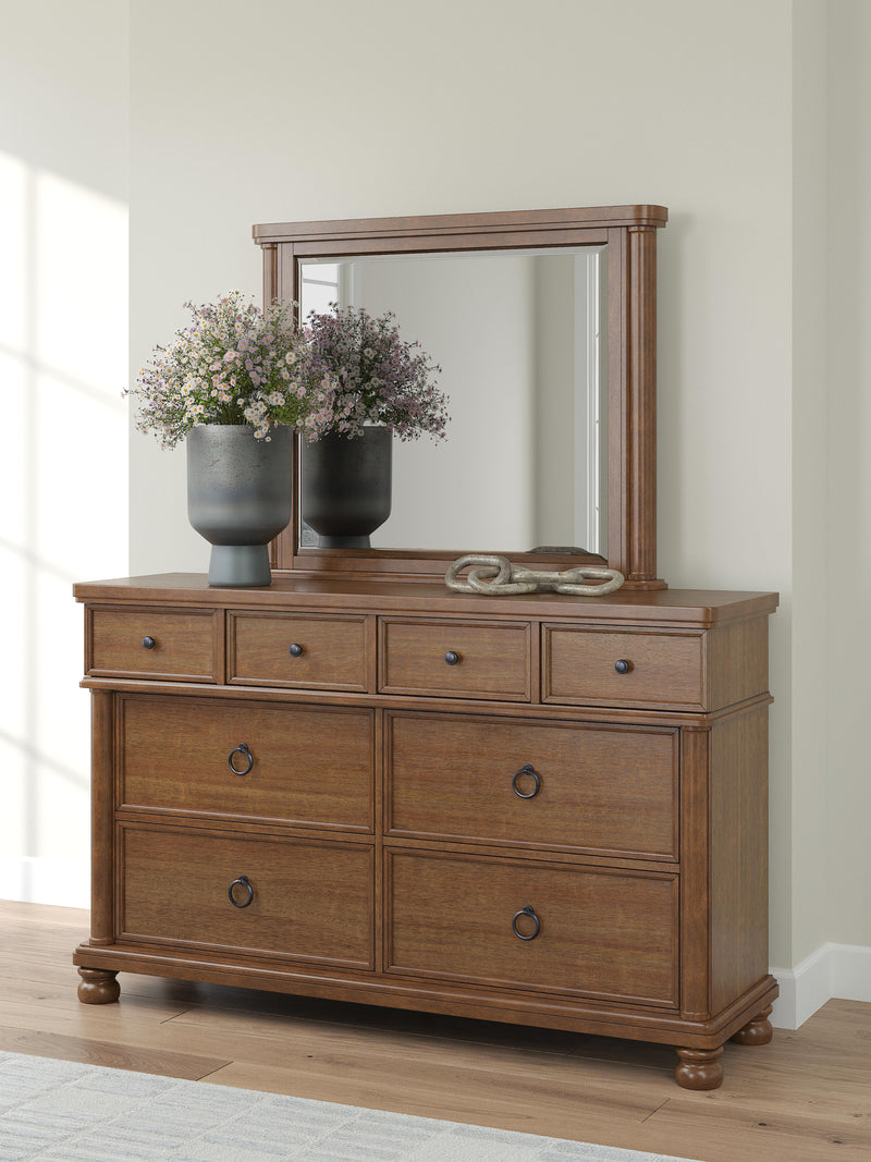 Ashley Furniture Rowlenstown bedroom set, including a bed frame, dresser, and nightstands, with a modern wood finish.