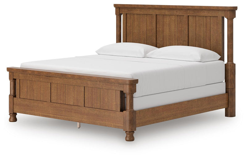 Ashley Furniture Rowlenstown bedroom set with a bed, matching nightstands, and a dresser in a modern bedroom scene.