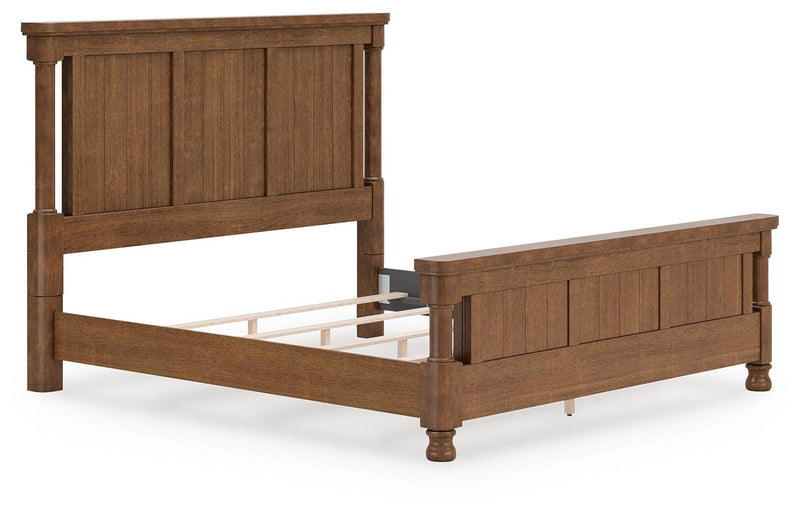 Ashley Furniture Chadworth Bed in a neutral fabric, showcasing a stylish bed frame with a padded headboard and elegant design.