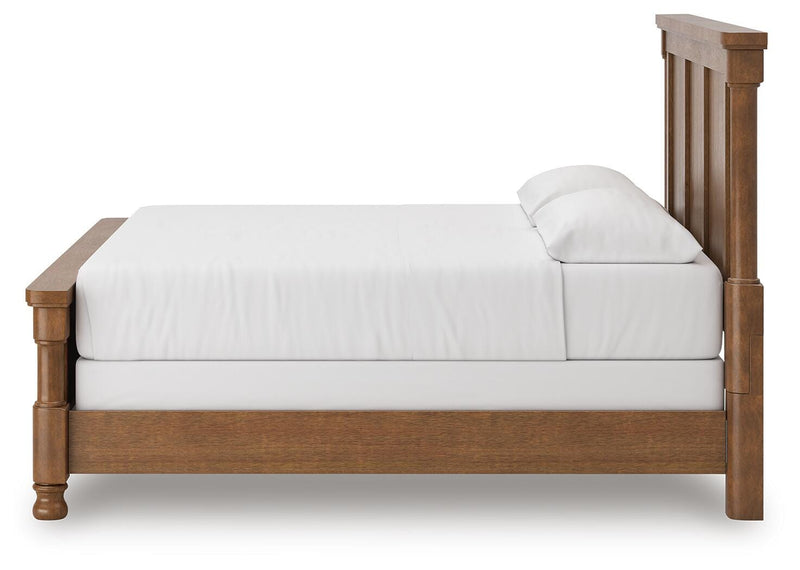 Ashley Furniture Rowlenstown bedroom set with a bed, dresser, and nightstands in a modern bedroom scene.