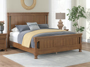 Ashley Furniture Rowlenstown Bedroom Set featuring a bed frame, dresser, and nightstands with a contemporary design.