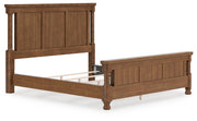 Ashley Furniture Chadworth Bed with a dark wood finish, showcasing a classic frame and elegant headboard design.