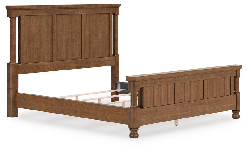 Ashley Furniture Chadworth Bed with a dark wood finish, showcasing a classic frame and elegant headboard design.