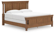 Ashley Furniture Rowlenstown bedroom set with a bed, nightstands, and dresser in a modern design, shown from an angled view.