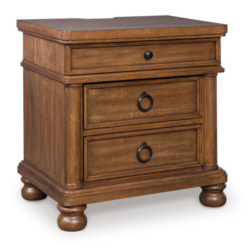 Ashley Furniture Rowlenstown bedroom set with a closed-angle view of a bed, dresser, and nightstands in a modern bedroom.