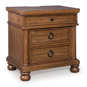 Ashley Furniture Rowlenstown bedroom set with a closed wardrobe, featuring a modern design and wood finish in a stylish bedroom scene.