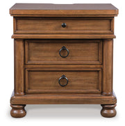 Ashley Furniture Rowlenstown bedroom set featuring a stylish bed frame and matching furniture in a modern bedroom setting.