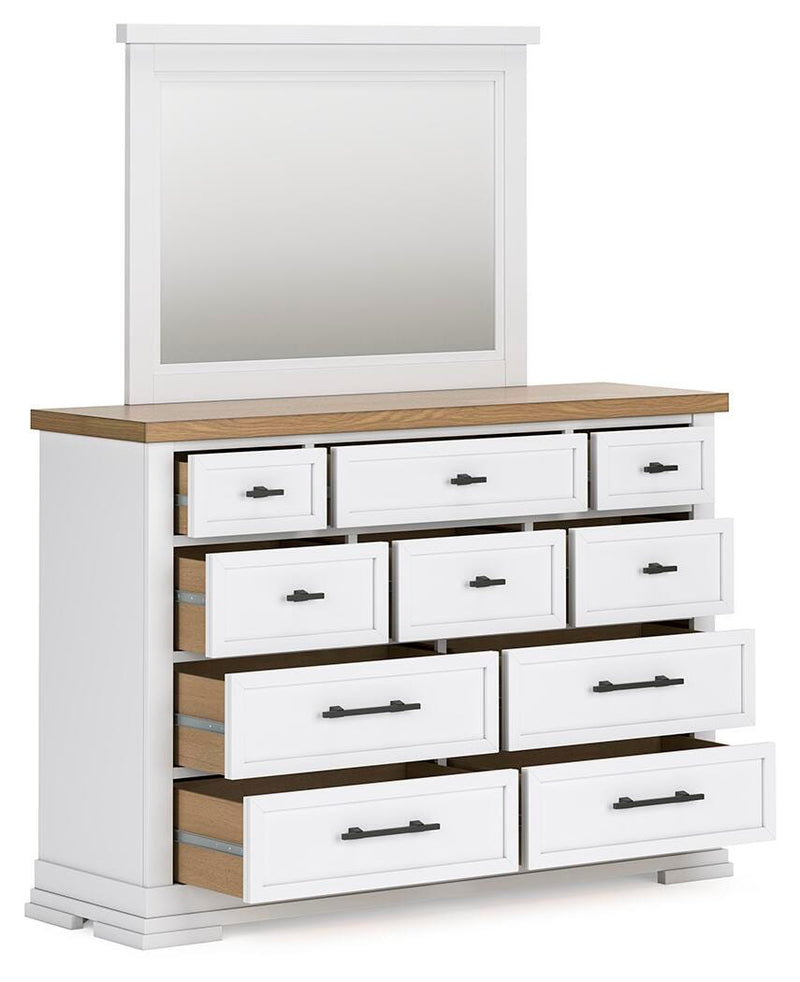 Ashley Furniture Ashbryn bedroom set with open view of bed, dresser, and nightstands in a modern bedroom setup.
