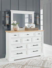 Ashley Furniture Ashbryn bedroom set featuring a bed, dresser, and nightstands in a coordinated bedroom package.