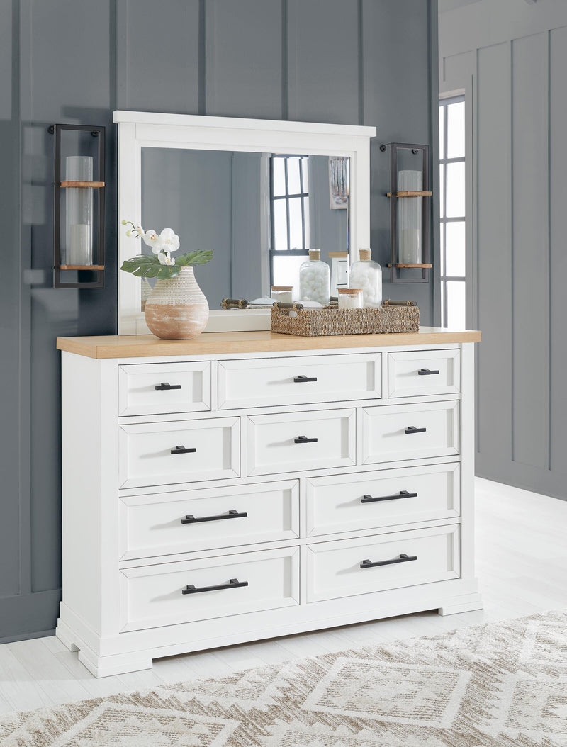 Ashley Furniture Ashbryn bedroom set featuring a bed, dresser, and nightstands in a coordinated bedroom package.