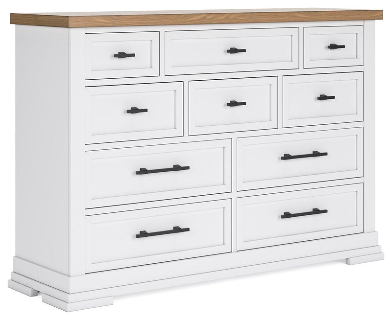 Ashley Furniture Ashbryn Dresser with sleek wood finish and multiple drawers, shown from an angled side view.