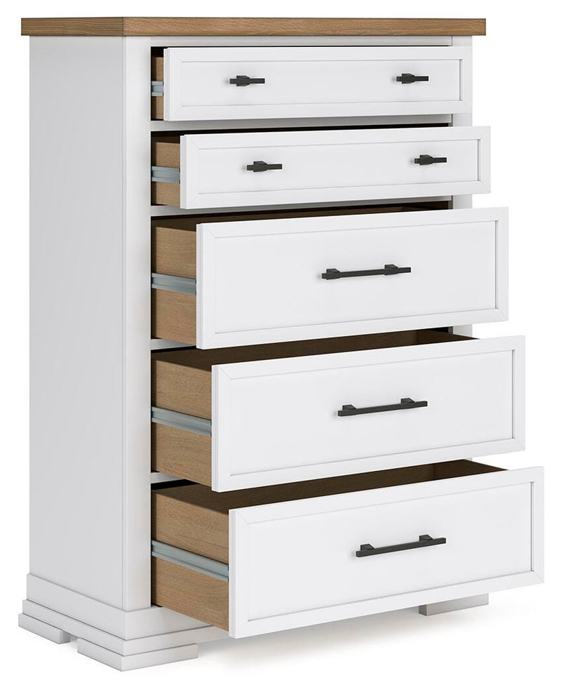 Ashbryn Chest of Drawers by Ashley Furniture, angled open view showing multiple drawers and wood finish in a modern bedroom setting.