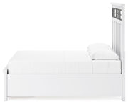 Ashley Furniture Ashbryn bedroom set with a bed, matching nightstands, and dresser in a modern bedroom interior.