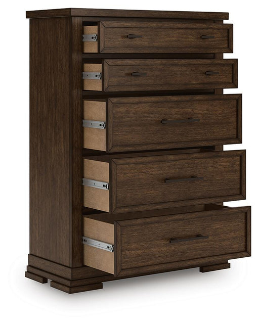 Ashley Furniture Taffenbrook chest of drawers shown from an open angle, highlighting its wooden finish and spacious storage drawers.