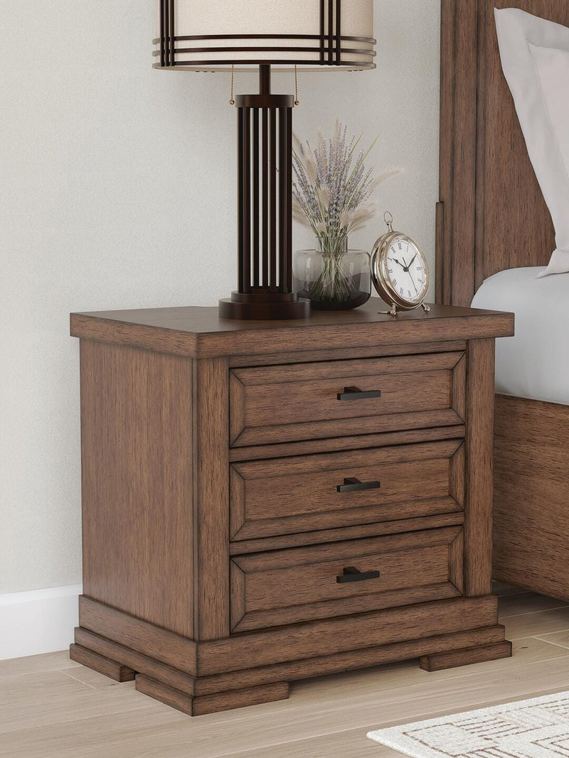 Ashley Furniture Taffenbrook nightstand with wood finish and sleek drawer, ideal for bedroom storage and decor.