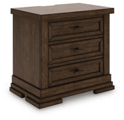 Ashley Furniture Taffenbrook nightstand with a dark wood finish, angled design, and modern hardware, shown from an angle view.
