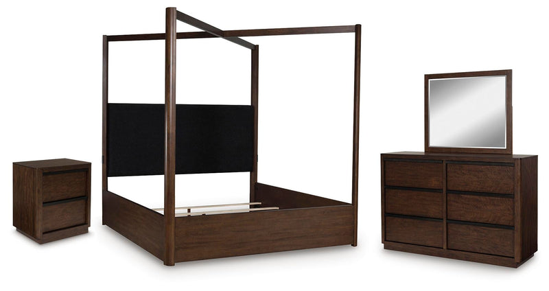 Ashley Furniture Dilenno bedroom set with a modern bed frame, dresser, and nightstands in a stylish bedroom scene.