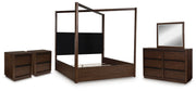 Ashley Furniture Dilenno bedroom set with bed, dresser, and nightstands in a modern design, shown in a stylish bedroom setting.