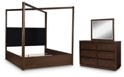 Ashley Furniture Dilenno bedroom set with a modern bed frame, matching nightstands, and a stylish dresser in a contemporary bedroom.