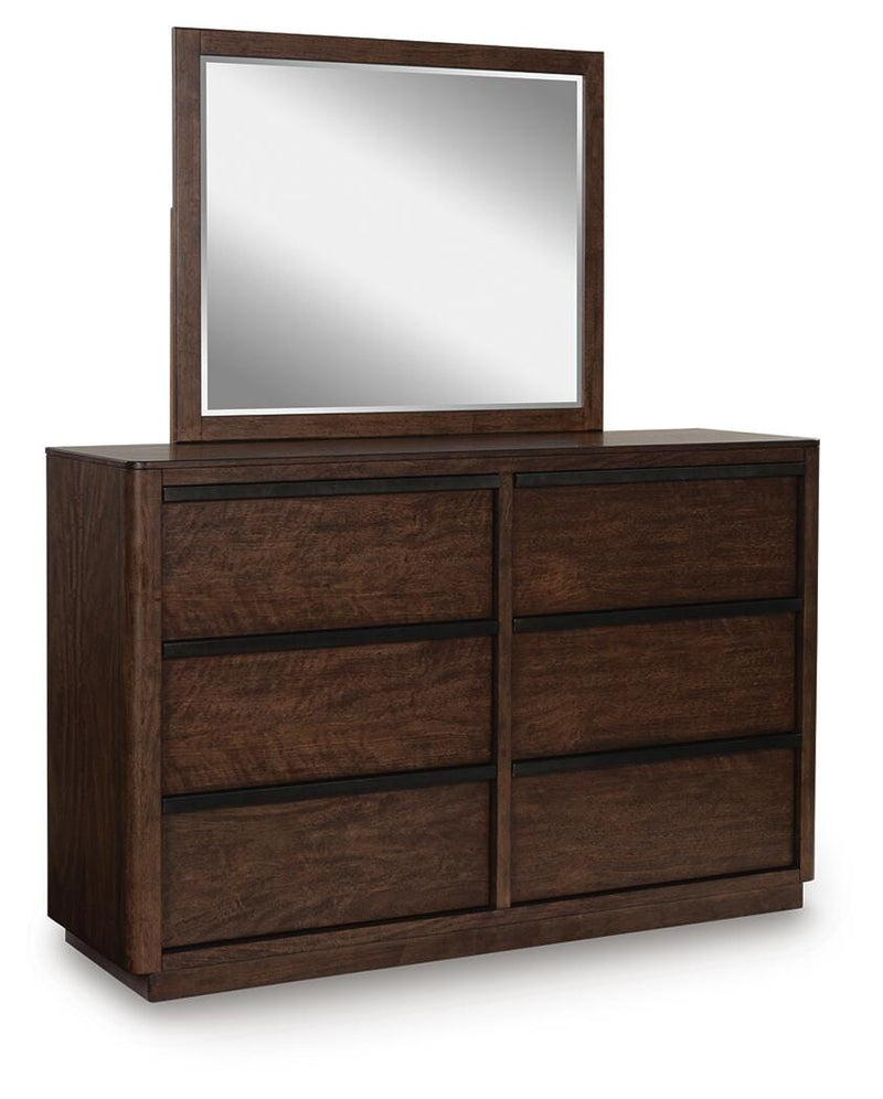 Ashley Furniture Dilenno bedroom set with a bed, nightstands, and dresser in a stylish, modern bedroom layout.