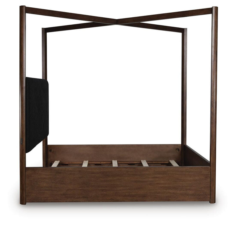 Ashley Furniture Dilenno bedroom set featuring a bed, nightstands, and matching furniture in a modern bedroom setting.