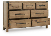 Ashley Furniture Ridgester dresser with open drawers, showing spacious storage and dark wood finish in a modern bedroom setting.