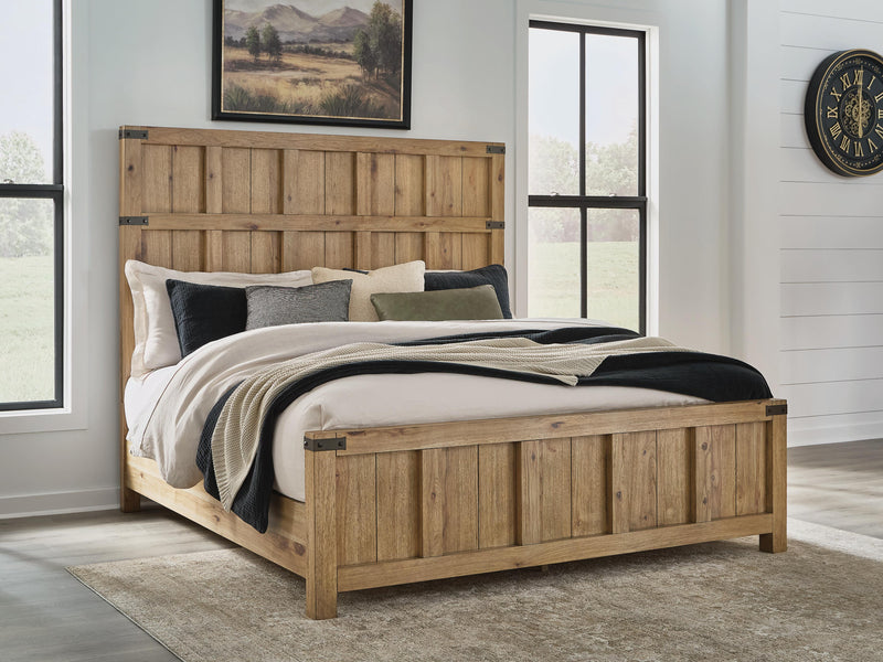 Ashley Furniture Ridgester bed with a wooden frame and headboard, shown in a cozy bedroom setting.