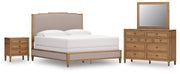 Ashley Furniture Sharlance bedroom set with a modern bed frame, matching nightstands, and coordinated bedding in a stylish bedroom scene.