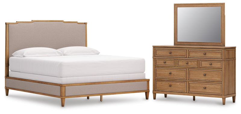 Ashley Furniture Sharlance bedroom set with a bed frame, nightstands, and dresser in a modern design, shown in a stylish bedroom setting.