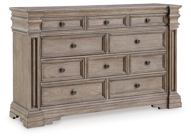 Ashley Furniture Blairhurst dresser with multiple drawers and polished wood finish, shown from an angled closed view.