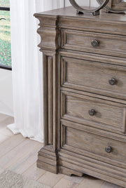 Close-up of the Ashley Furniture Blairhurst Dresser showing detailed wood finish and elegant drawer handles.