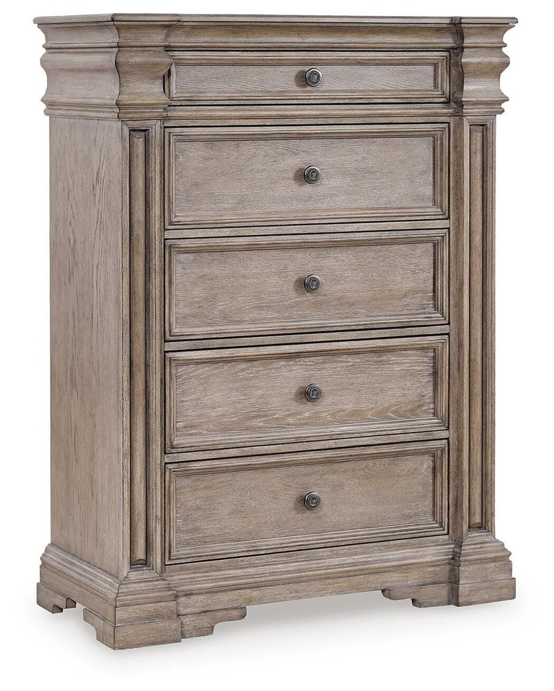 Ashley Furniture Blairhurst chest of drawers in a closed position, showcasing its sleek wooden design and elegant hardware.