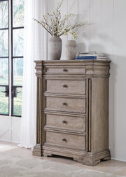 Ashley Furniture Blairhurst chest of drawers with a dark wood finish and modern design, featuring multiple spacious drawers.