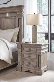 Ashley Furniture Blairhurst nightstand with a dark wood finish, featuring two drawers and sleek metal handles.